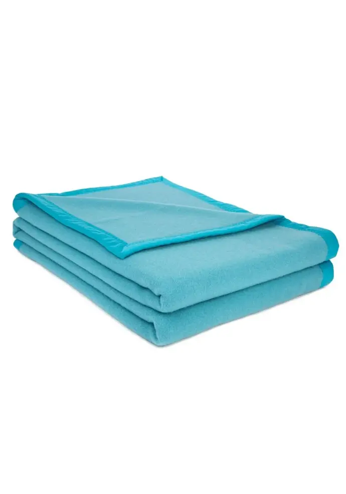 Couverture chaude et légère en mérinos fabrication française couleur bleu lagon