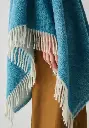 Poncho chaud en 100% baby lama avec franges